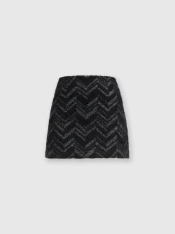 Bouclé mini skirt with lamé chevron motif