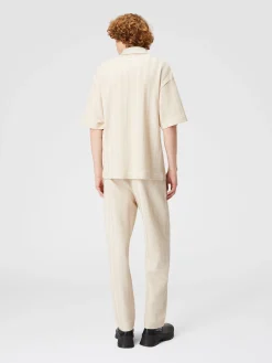 Boxy-fit knit polo shirt with tone-on-tone chevron