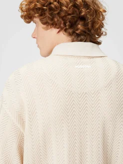 Boxy-fit knit polo shirt with tone-on-tone chevron