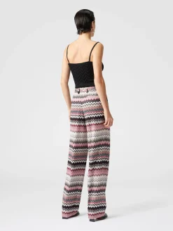 Classic trousers with lamé serrated zig zag pattern