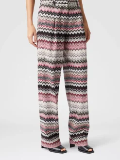 Classic trousers with lamé serrated zig zag pattern