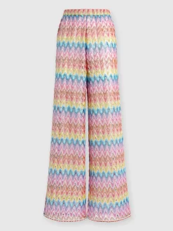 Coated cotton-blend lace trousers