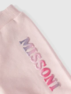 Cotton joggers with ruffles on the bottom and logo