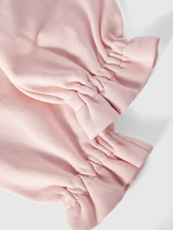 Cotton joggers with ruffles on the bottom and logo