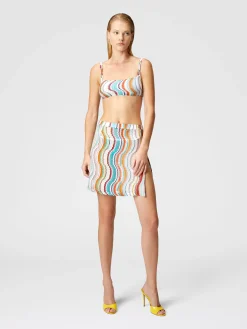 Cover-up miniskirt with lamé wave motif and slit