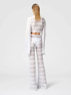 Crop top with wide sleeves and front knot in zig zag lamé viscose