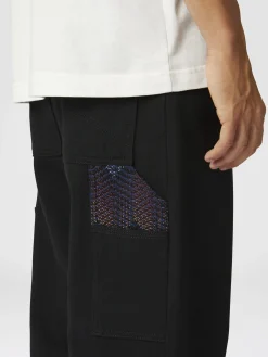 Denim cargo trousers with chevron knit inserts