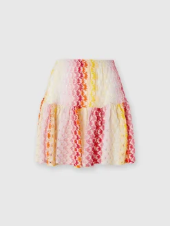 Dégradé lace-effect flounced miniskirt