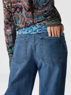 Five denim pockets with knit insert