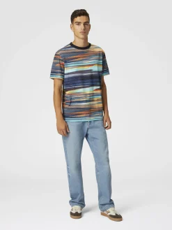 Five denim pockets with zigzag embroidery