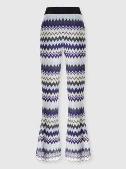 Flare trousers in zig zag lamé viscose