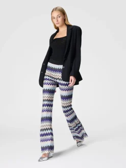 Flare trousers in zig zag lamé viscose