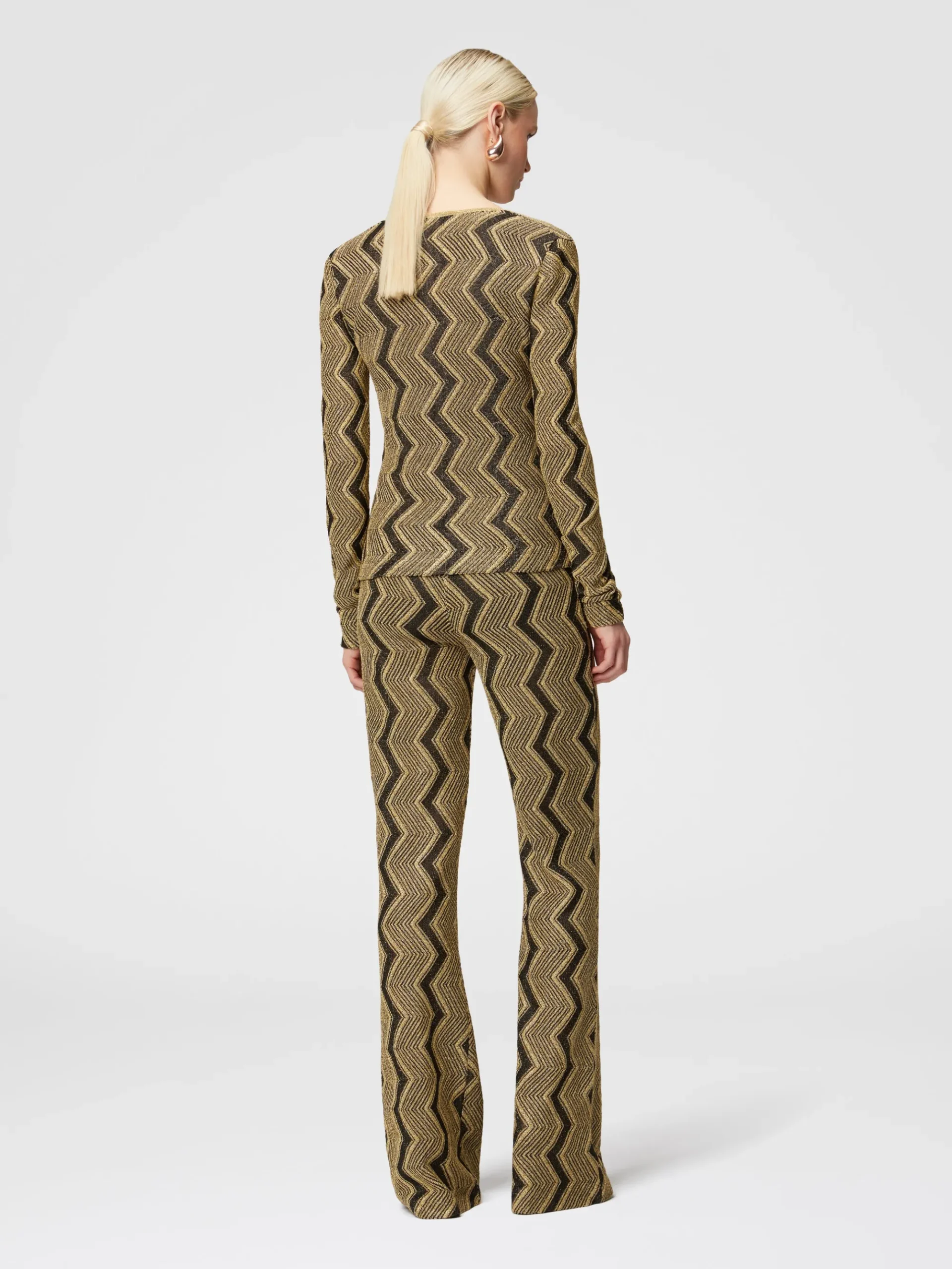 Flare trousers in zig zag lamé viscose