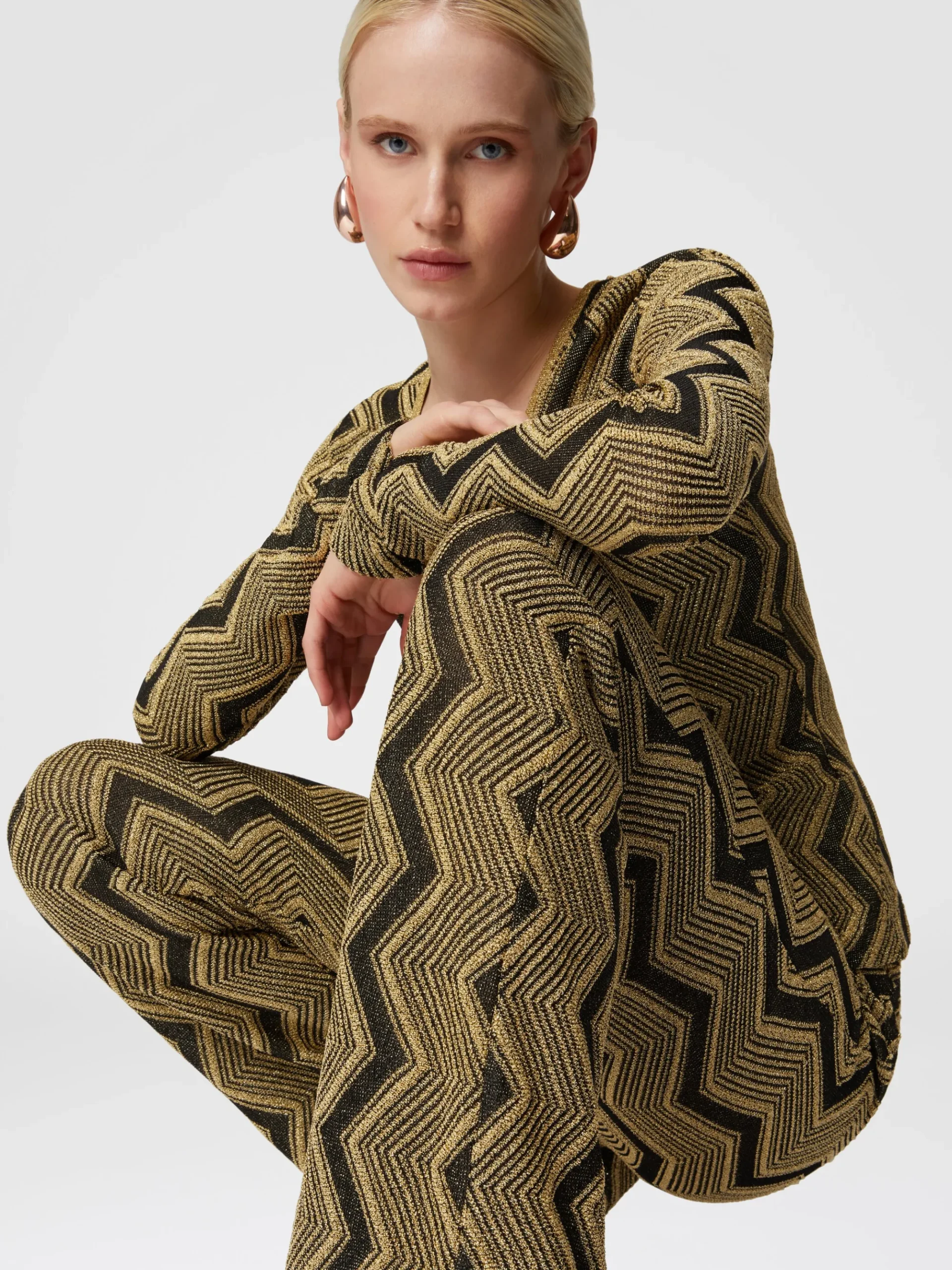 Flare trousers in zig zag lamé viscose