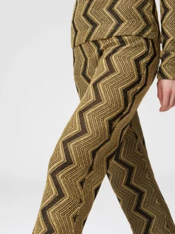 Flare trousers in zig zag lamé viscose