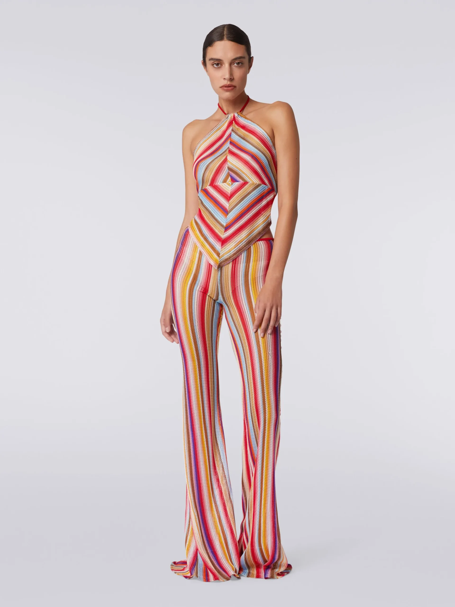 Flared trousers in striped crochet