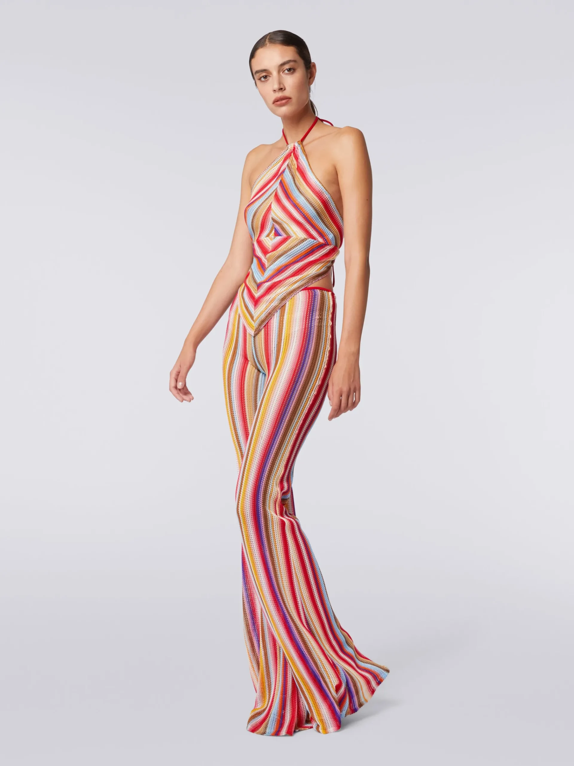 Flared trousers in striped crochet