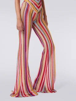 Flared trousers in striped crochet