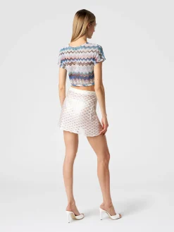 Lace-effect wrap-around miniskirt with glossy finish