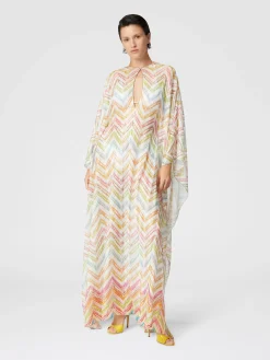 Long covered up in printed tulle with batwing sleeves