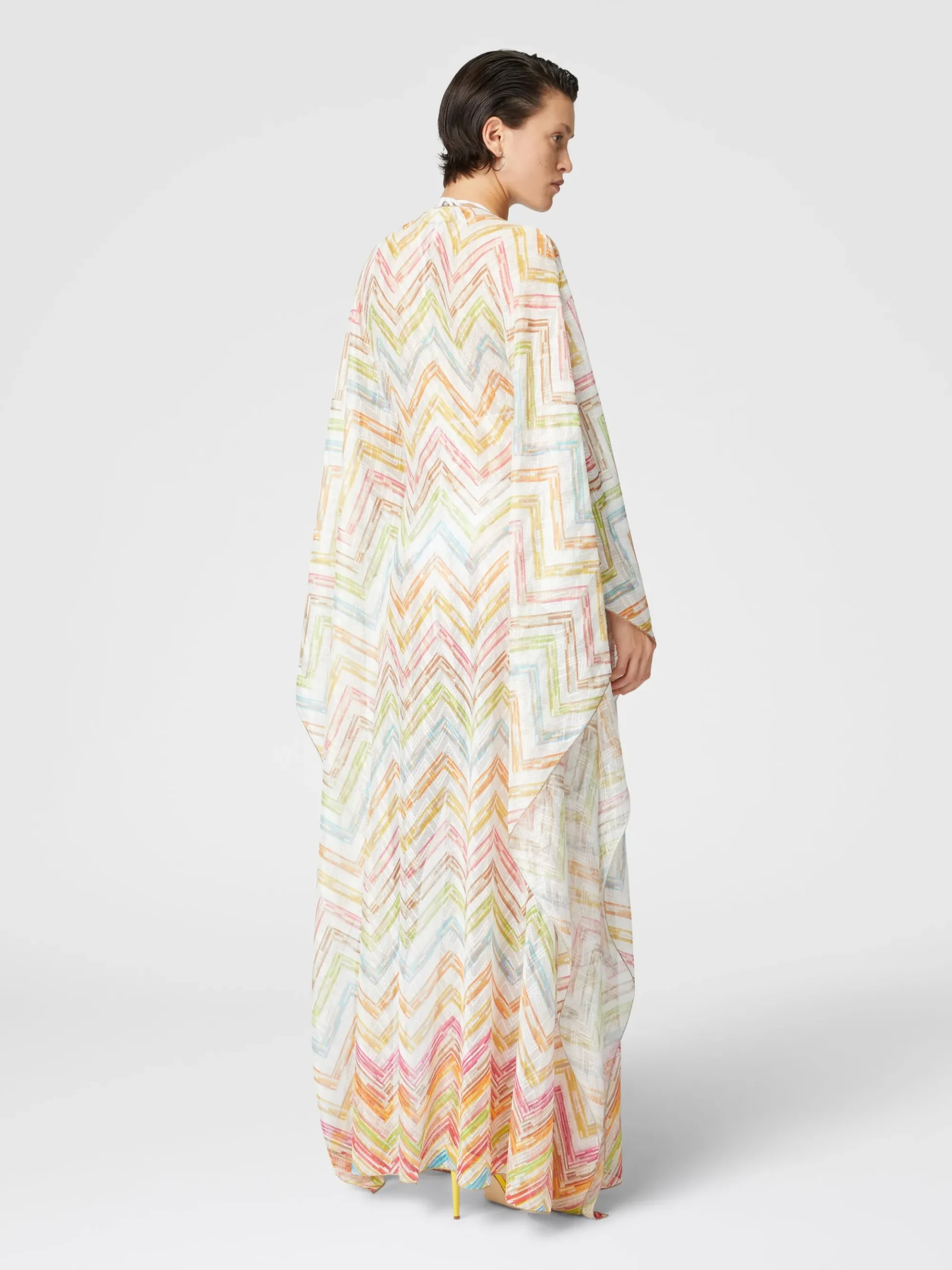 Long covered up in printed tulle with batwing sleeves
