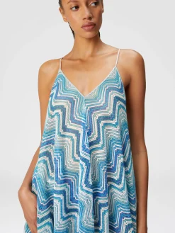 Long cover-up with neck scarf cut in chevron crochet lamé