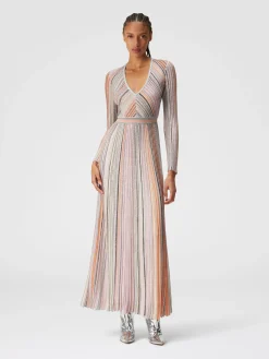 Long dress in lamé pleated knit