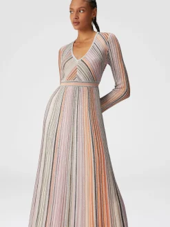Long dress in lamé pleated knit