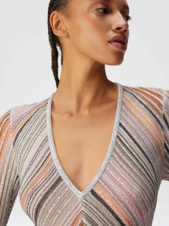 Long dress in lamé pleated knit