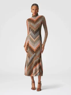 Long dress with flared hem and mock neck with zip