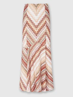 Long flared skirt with lamé serrated zig zag pattern
