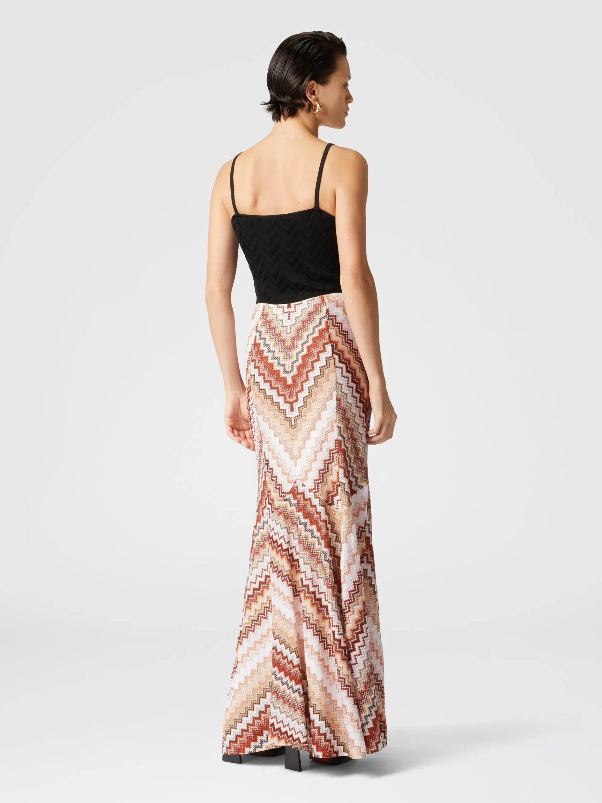 Long flared skirt with lamé serrated zig zag pattern