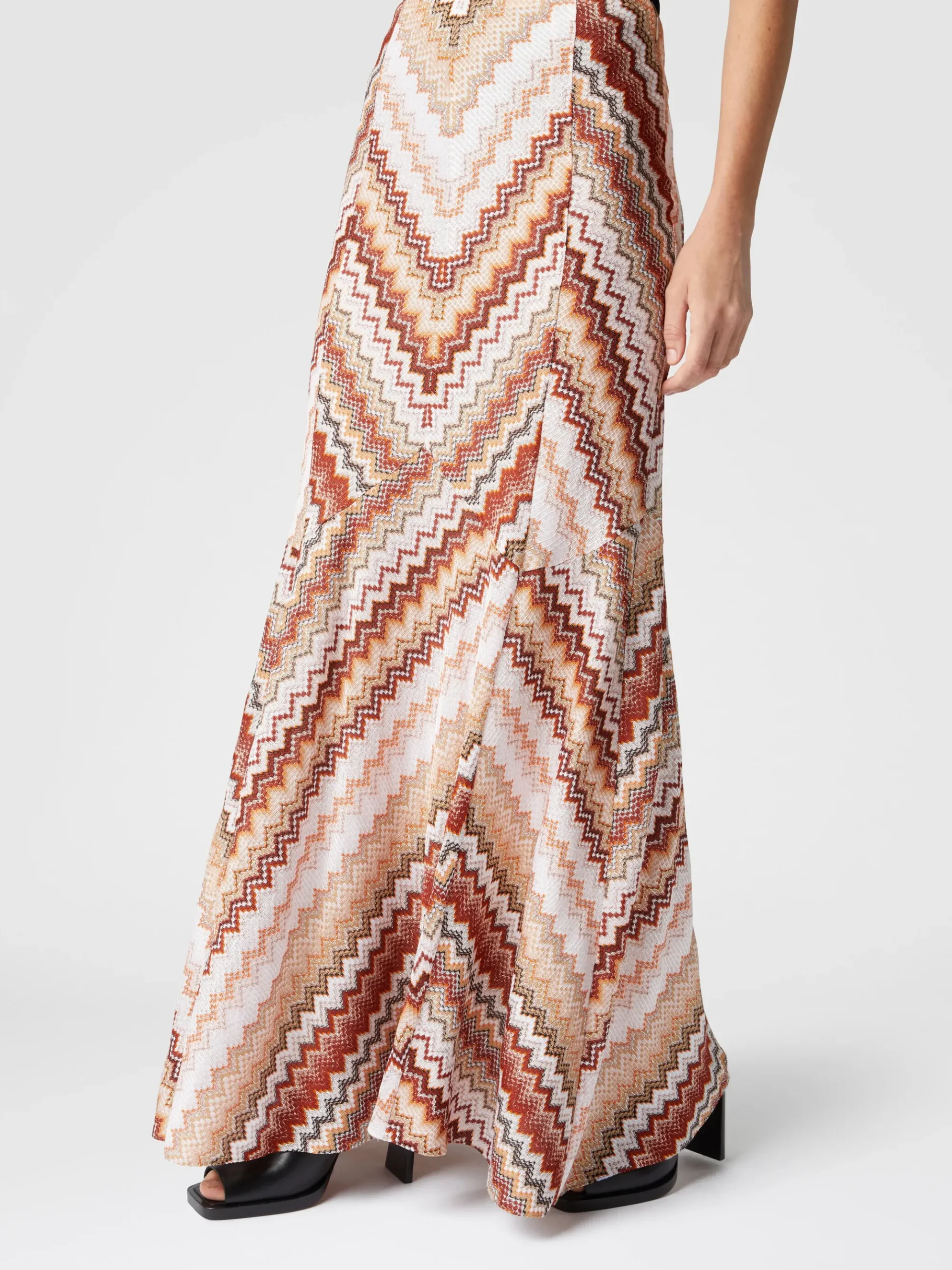 Long flared skirt with lamé serrated zig zag pattern