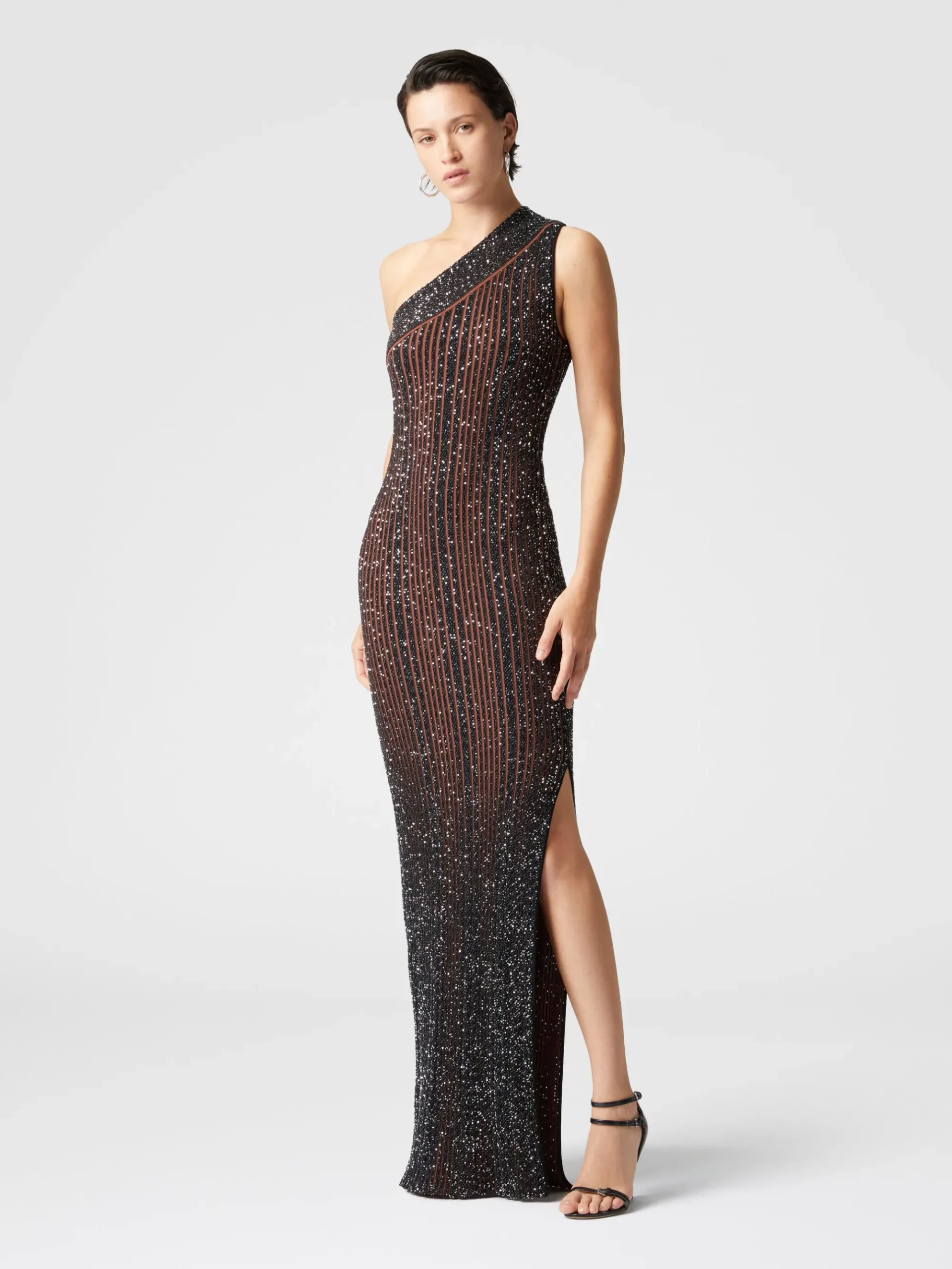 Long one-shoulder ribbed dress with sequins and slit