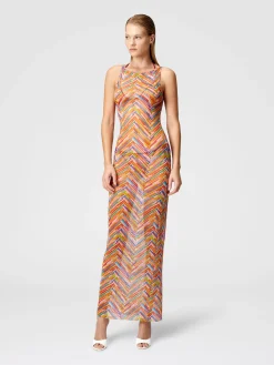 Long sleeveless dress in printed tulle