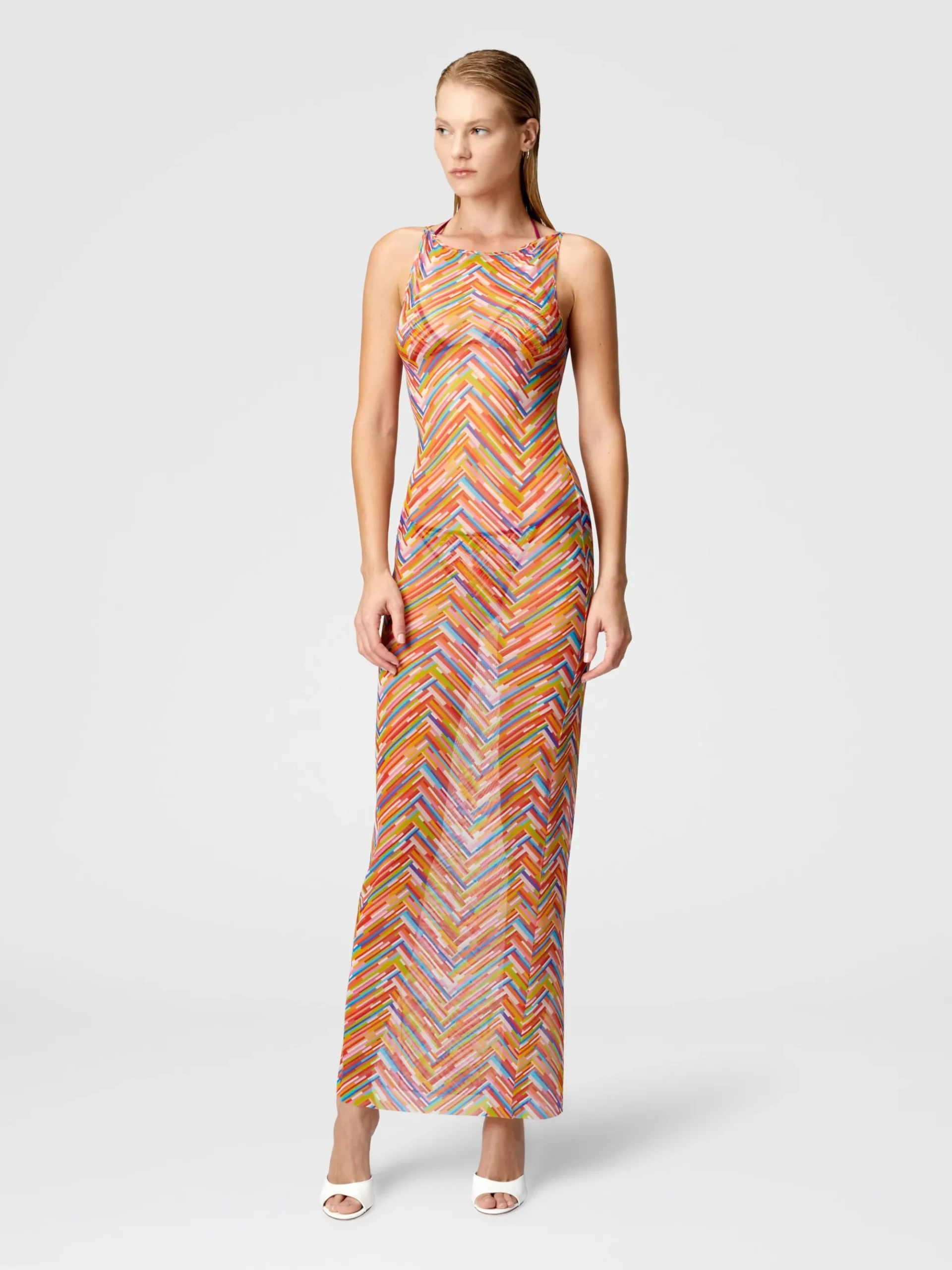 Long sleeveless dress in printed tulle