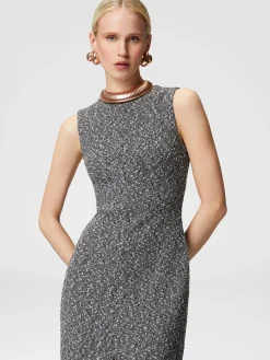 Long sleeveless dress with deep central slit