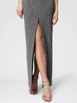 Long sleeveless dress with deep central slit