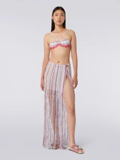 Long wrap-around skirt with fringes and lurex