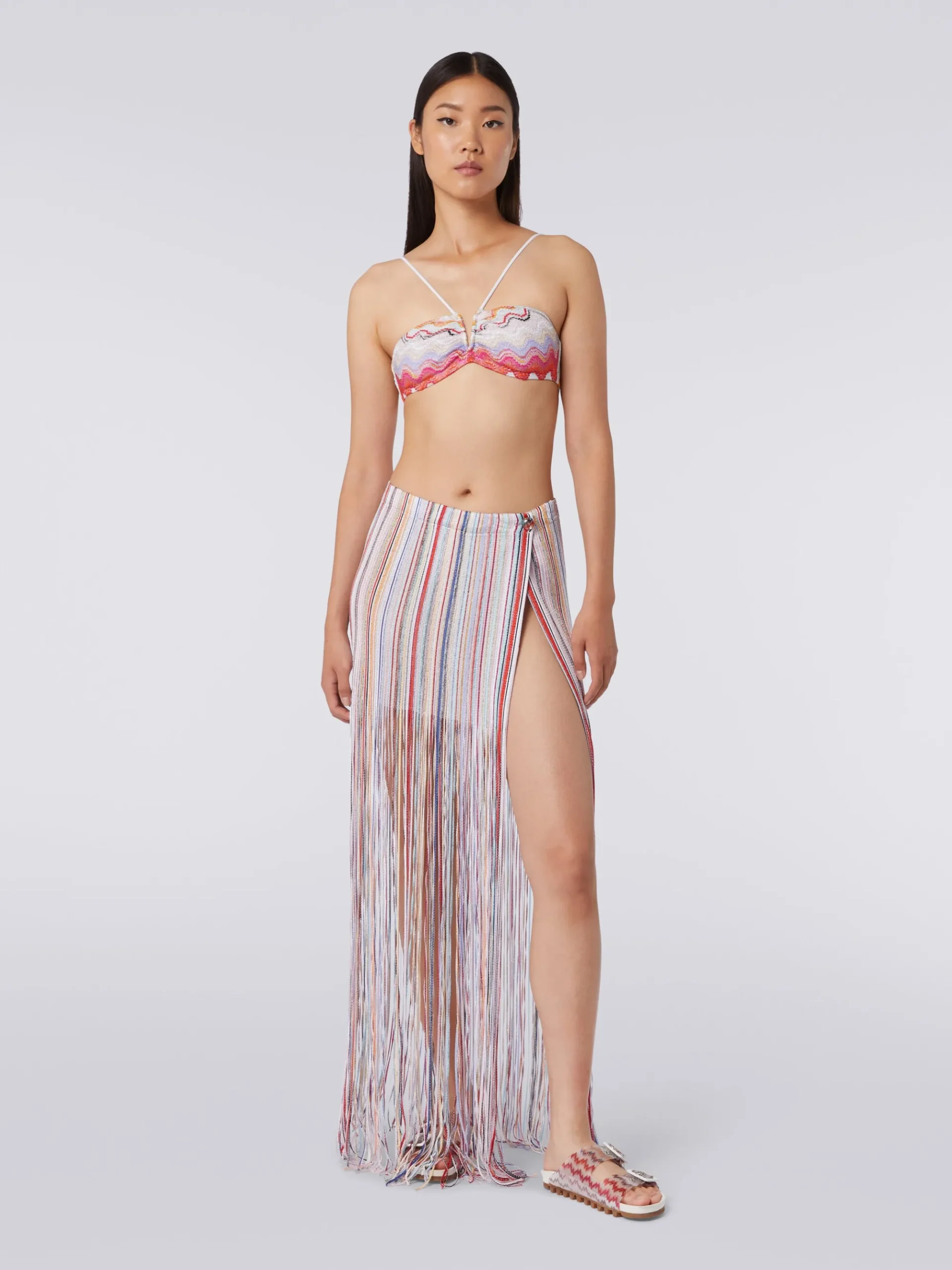 Long wrap-around skirt with fringes and lurex