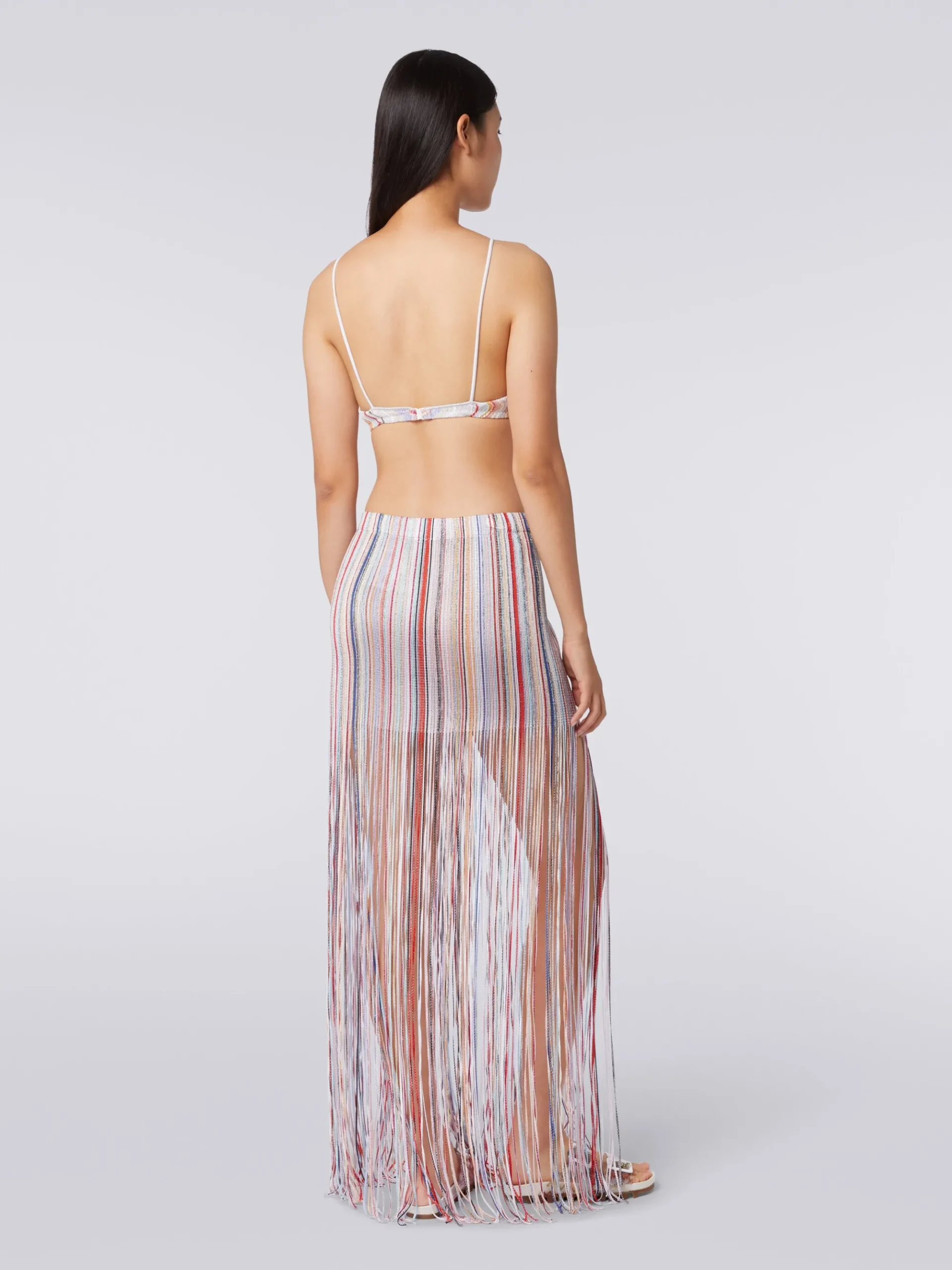 Long wrap-around skirt with fringes and lurex