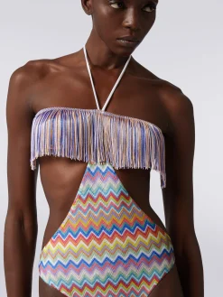One-piece swimming costume with zigzag print and fringes