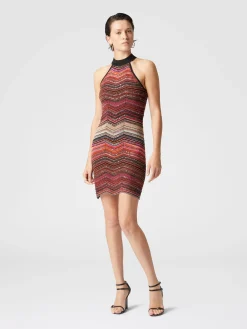 Short sleeveless chevron lamé dress with sequins and halter neckline