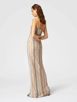 Sleeveless dress with zig zag lamé fret and central button placket