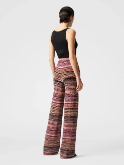 Straight trousers in lamé viscose embossed with wave pattern