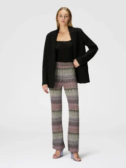 Straight trousers with glare-patterned zig zag lamé