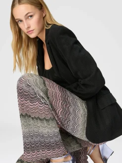 Straight trousers with glare-patterned zig zag lamé