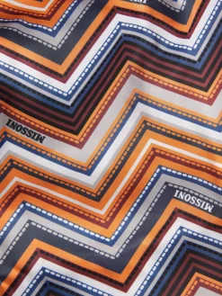Swim shorts with zig zag print and logo