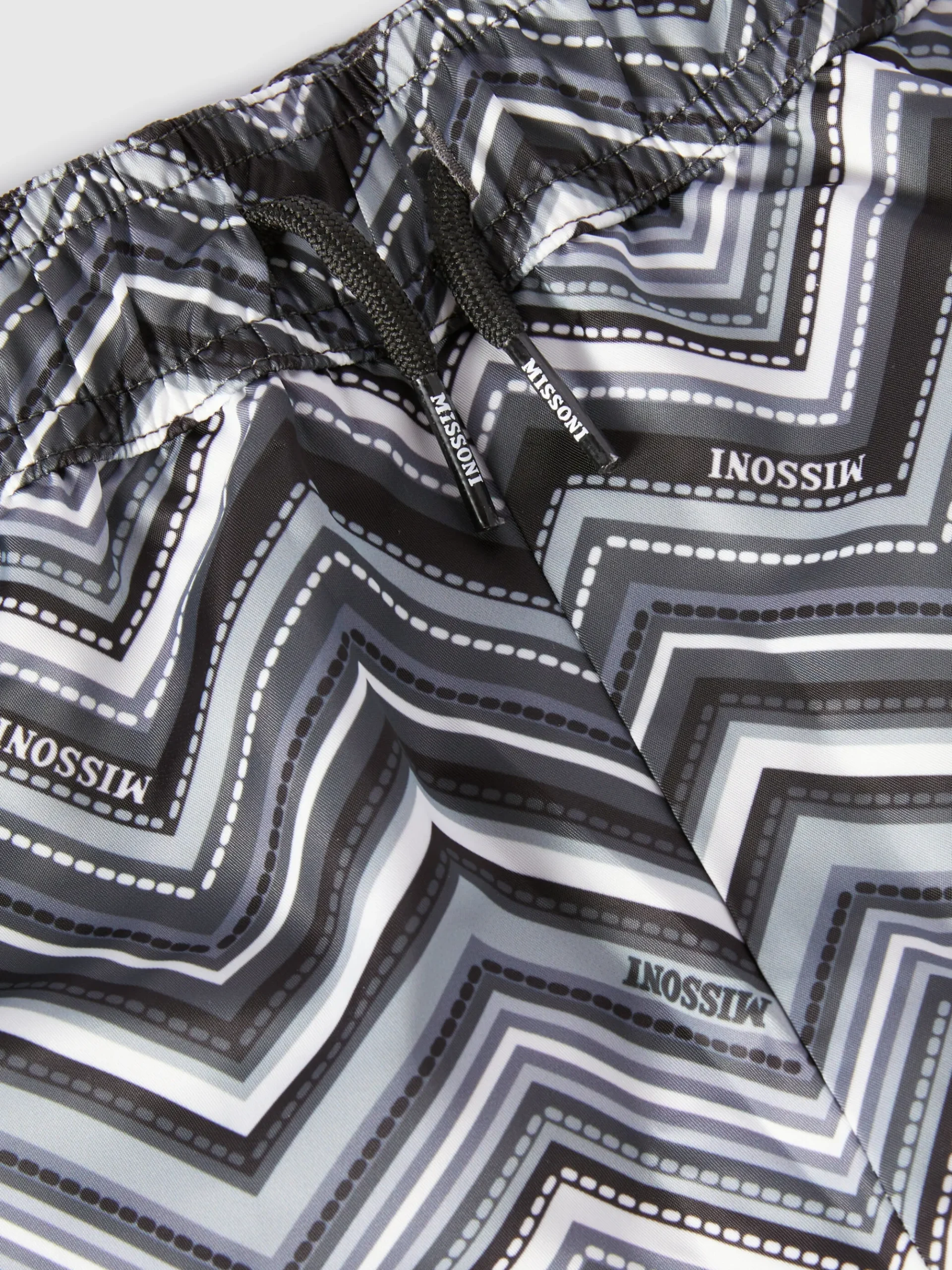 Swim shorts with zigzag print and drawstring waist