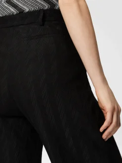 Tone-on-tone zigzag motif carrot-fit trousers